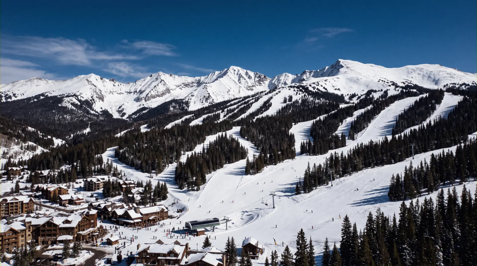 A groomed run dropping into a slopeside village at first light, the shortlist for the best ski-in ski-out resorts in Colorado