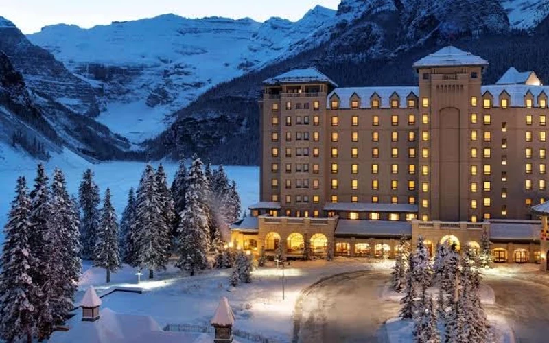 Fairmont Chateau Lake Louise on the frozen lakeshore, the best-known hotel near the ski-in ski-out lodging of Banff National Park, Alberta