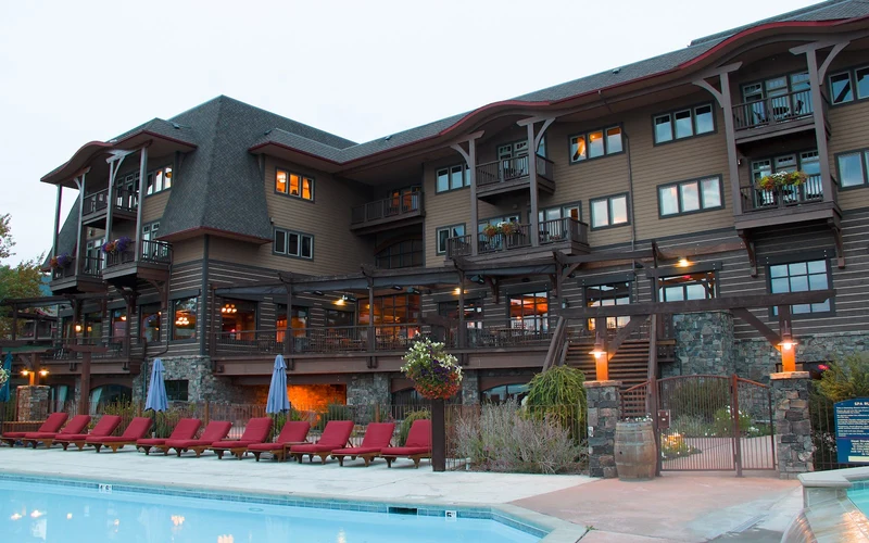 The Lodge at Whitefish Lake on the lake shore, shuttle-distance lodging from the ski-in ski-out properties at Whitefish Mountain Resort, Montana