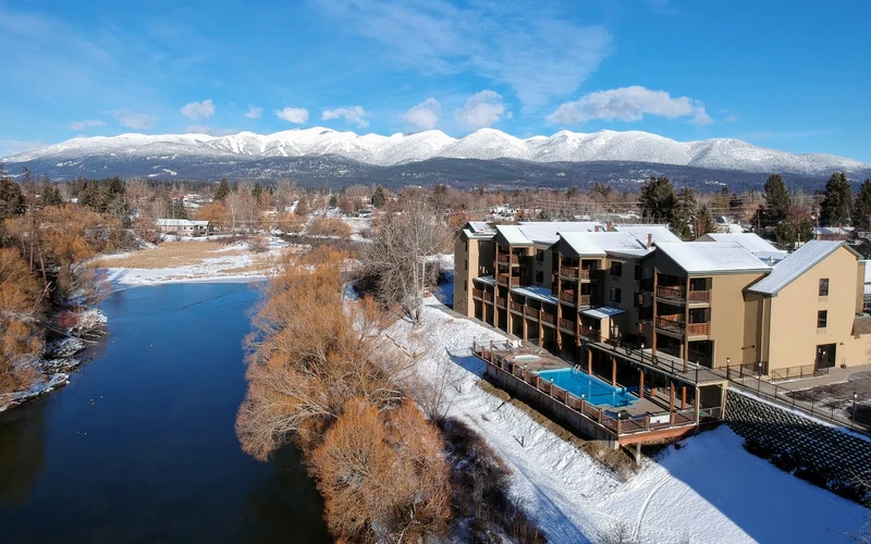 Whitefish Riverfront Hotel on the Whitefish River in town, shuttle-distance from the ski-in ski-out lodging at Whitefish Mountain Resort, Montana